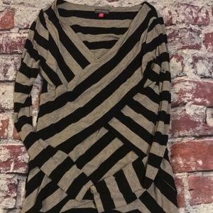 Women’s black and gray long sleeve shirt.